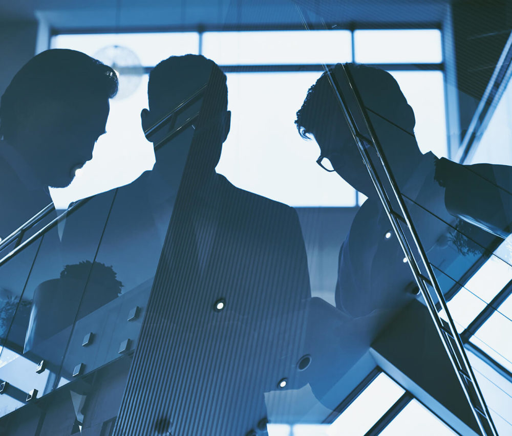 reflection-of-three-men-PXDYH77(1)